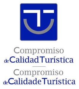 un logo pour la société T appelée catedral turismo dans l'établissement Apartamentos Aurelia Antica, à Saint-Jacques-de-Compostelle