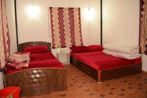 Postel nebo postele na pokoji v ubytování Nagarkot Trekkers Inn + 37 fotografií