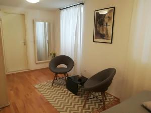 Posedenie v ubytovaní Rooms Andro