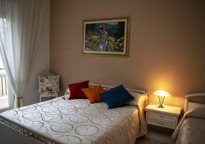 Ένα ή περισσότερα κρεβάτια σε δωμάτιο στο La casa D'a...mare