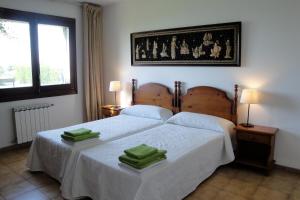 Postel nebo postele na pokoji v ubytování MEDDAYS VILLA REDOS