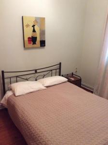 Voodi või voodid majutusasutuse Apartment Gio III toas