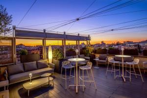 A balcony or terrace at Monti Palace Hotel