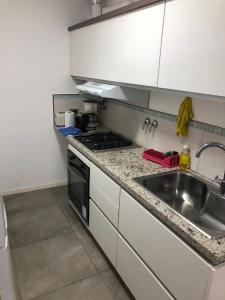 Una cocina o kitchenette en Residencia Pasco