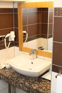 A bathroom at Emir Royal Hotel
