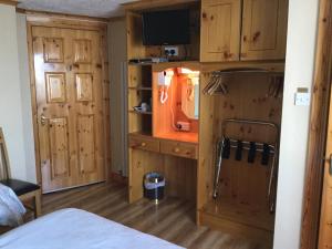 Ένα ή περισσότερα κρεβάτια σε δωμάτιο στο Algret House B&B