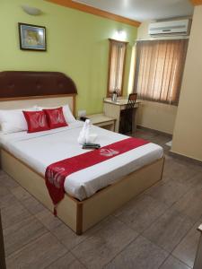 Ένα ή περισσότερα κρεβάτια σε δωμάτιο στο Kingston Palace