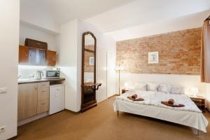 Kuchyň nebo kuchyňský kout v ubytování Janne Hotel