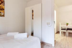 Postel nebo postele na pokoji v ubytování Barnapartments Monumental