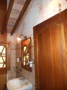 Koupelna v ubytování Villa Loghino