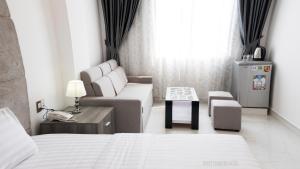 Una cama o camas en una habitación de White Diamond Hotel - Airport