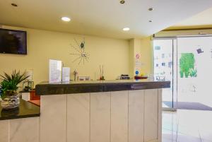 Kuchyň nebo kuchyňský kout v ubytování Timos Hotel