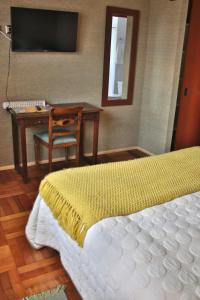 Cama o camas de una habitación en Hostal Itaf