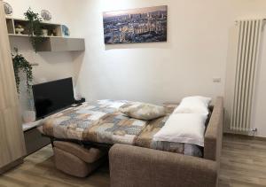 A bed or beds in a room at Central Lepetit apartment De Luxe