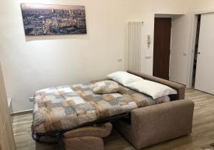 A bed or beds in a room at Central Lepetit apartment De Luxe