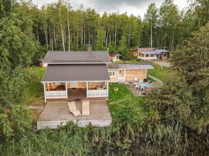 an aerial view of a house with a deck at Holiday Home Joutsen by Interhome in Verla