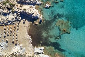 an aerial view of a beach and the water at Parian Boutique Hotel in Naousa