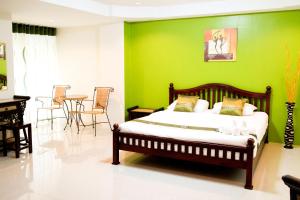 מיטה או מיטות בחדר ב-Spa Guest House