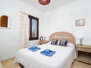 Postel nebo postele na pokoji v ubytování Holiday Home Sunshine by Interhome