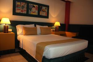 Letto o letti in una camera di Hotel Guadaira Resort