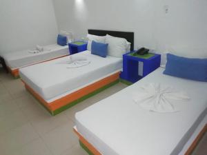 Letto o letti in una camera di Hotel Guadaira Resort