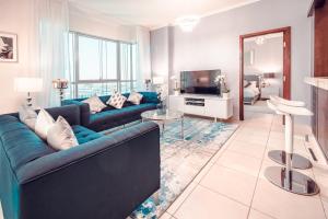 אזור ישיבה ב-Burj Grand Apartment - Four Bedrooms