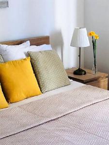 Postel nebo postele na pokoji v ubytování Apartments Barbaresko