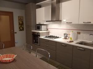 Cuisine ou kitchenette dans l'établissement Mastro Toto' - Rooms & Apartment