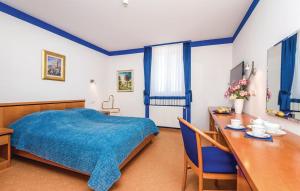 Ein Bett oder Betten in einem Zimmer der Unterkunft Apartments and Rooms kod Eli