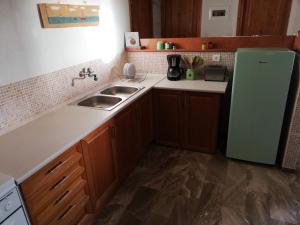Kuchyň nebo kuchyňský kout v ubytování Alice House