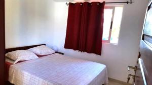 Vuode tai vuoteita majoituspaikassa Basic Hotel