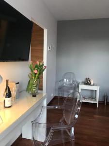 TV a/nebo společenská místnost v ubytování 4 All Apart Hotel