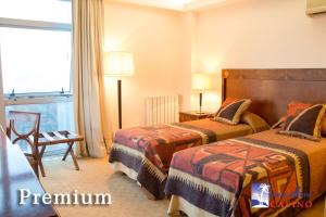 Ένα ή περισσότερα κρεβάτια σε δωμάτιο στο Palmar Hotel Casino +121 φωτογραφίες