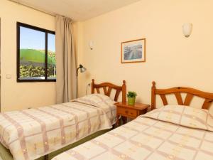 Posteľ alebo postele v izbe v ubytovaní Apartment Euromar by Interhome