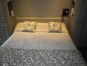 En eller flere senge i et værelse på Hôtel des Vosges 5 rue de la gare