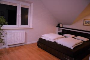 Postel nebo postele na pokoji v ubytování Tarnów Dom / Apartament w Centrum