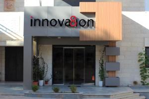 a building with an innovation sign in front of it at innova8ion in Bethlehem