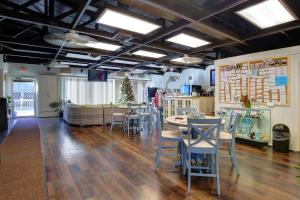 a large room with tables and chairs in a store at Outer Banks Beach Club in Kill Devil Hills