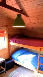 Postel nebo postele na pokoji v ubytování La Cabaña de Piedra + 34 fotografií