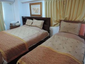 Кровать или кровати в номере Nikko Park Lodge Tobu Station