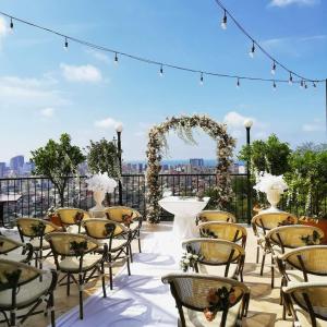 a set up for a wedding on the roof of a building at Sputnik Hotel Batumi in Batumi