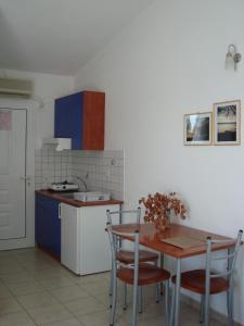 Kuchyň nebo kuchyňský kout v ubytování Lappas Rooms