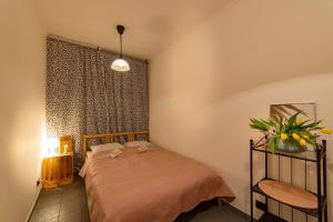 Postel nebo postele na pokoji v ubytování Hostel PrzyMorze