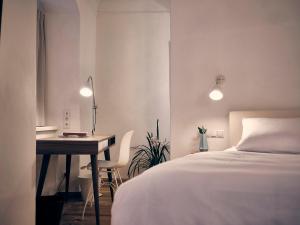 Posteľ alebo postele v izbe v ubytovaní Hotel kontor