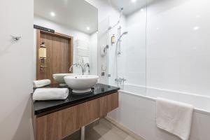 Kúpeľňa v ubytovaní Browary Warszawskie P&O Serviced Apartments + 37 fotografií