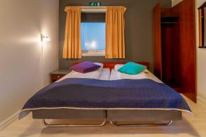 Postel nebo postele na pokoji v ubytování Melbu Hotell