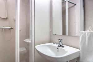 Koupelna v ubytování Melbu Hotell