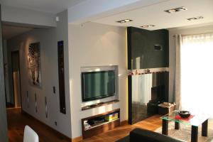 A television and/or entertainment centre at Villa ENERGY