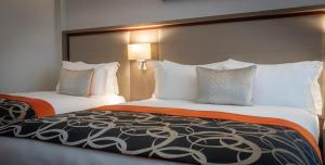 Voodi või voodid majutusasutuse Clayton Hotel Charlemont toas