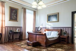 Posteľ alebo postele v izbe v ubytovaní Pałac w Małkowie